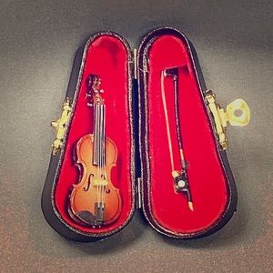 Tiny Violin (w/bow and hard case) from Austria.